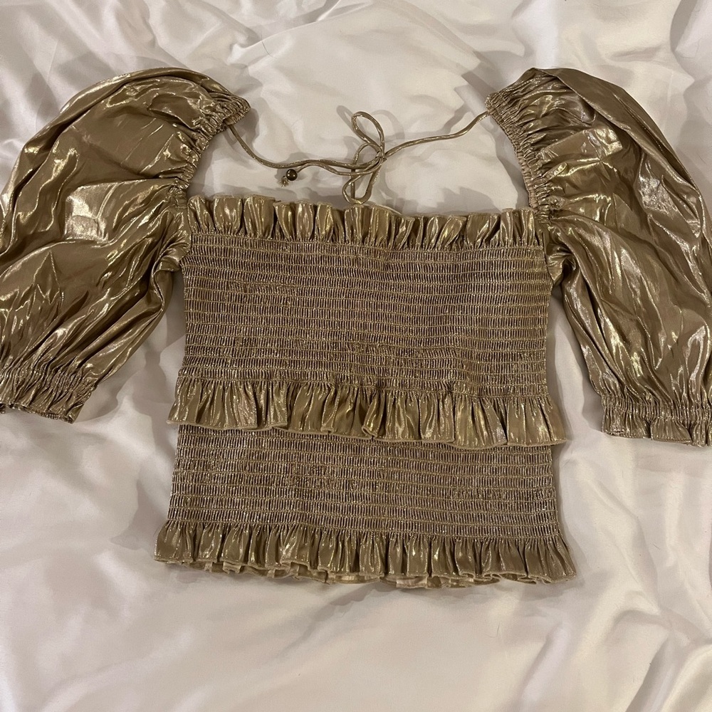 V. Chapman gold shirt